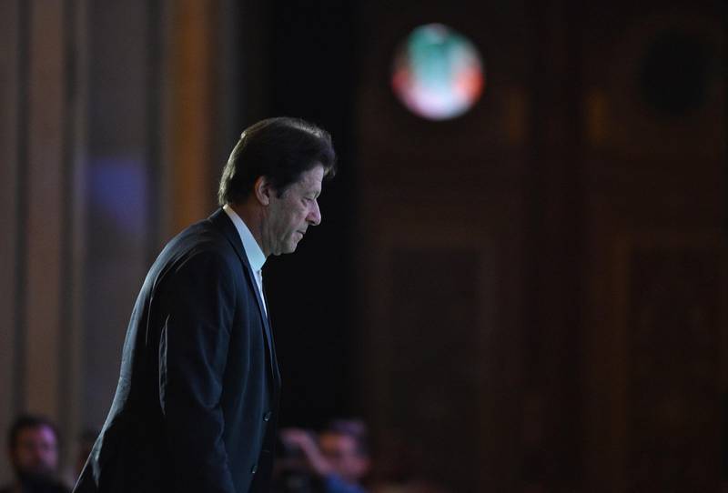 A picture taken October 23, 2018 shows Pakistani Prime Minister Imran Khan as he arrives to attend the opening ceremony of the Future Investment Initiative FII conference taking place in Riyadh from 23-25 October. Saudi Arabia is hosting a key investment summit overshadowed by the killing of critic Jamal Khashoggi that has prompted a wave of policymakers and corporate giants to withdraw. / AFP / FAYEZ NURELDINE
