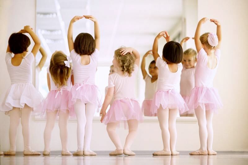 Ballet dancers performing in front of mirror in pink leotards and tutus (Courtesy: James & Alex Dance Studios)