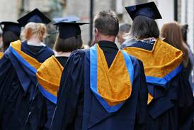 Student loan rates in England slashed 