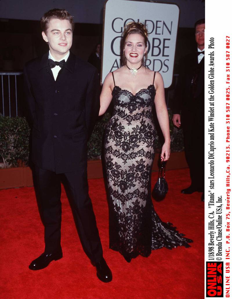 385255 01 : 1/18/98 Beverly Hills, CA. "Titanic" stars, Leonardo DiCaprio and Kate Winslet at the Golden Globe Awards held at the Beverly Hilton.