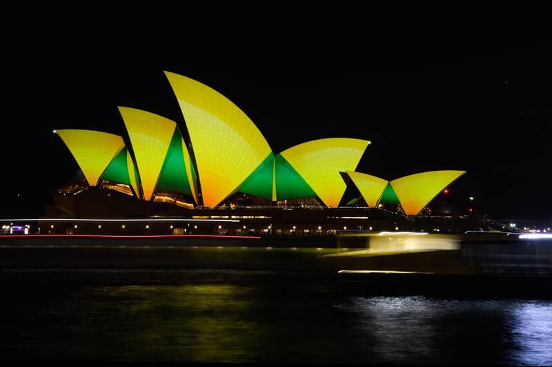 The Sydney Opera House is lit up in green and gold ahead of Australia's World Cup match against Argentina. EPA