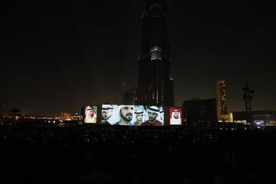 United Arab Emirates- Dubai - January 4, 2010:NATIONAL: Sheikh Mohammed bin Rashid's image is displayed on a big screen during the grand opening of the Burj Khalifa in Dubai on Monday, January 4, 2010. Amy Leang/The National EDITORS NOTE: Building was opened at 8pm on January 4th, 2010 at which point the name changed from Burj Dubai to Burj Khalifa. Official name is now Burj Khalifa *** Local Caption ***  amy_010410_burj_30.jpg