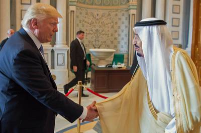 King Salman of Saudi Arabia and US president Donald Trump shaking hands at the opening session of the Gulf Cooperation Council summit in Riyadh, Saudi Arabia. EPA / Saudi Press Agency 



