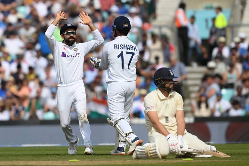 India captain Virat Kohli celebrates the run out of England batsman Dawid Malan on Day 5 of the fourth Test at The Oval on Monday, September 6. Getty