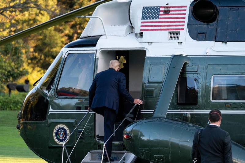 President Donald Trump boards Marine One. AP Photo