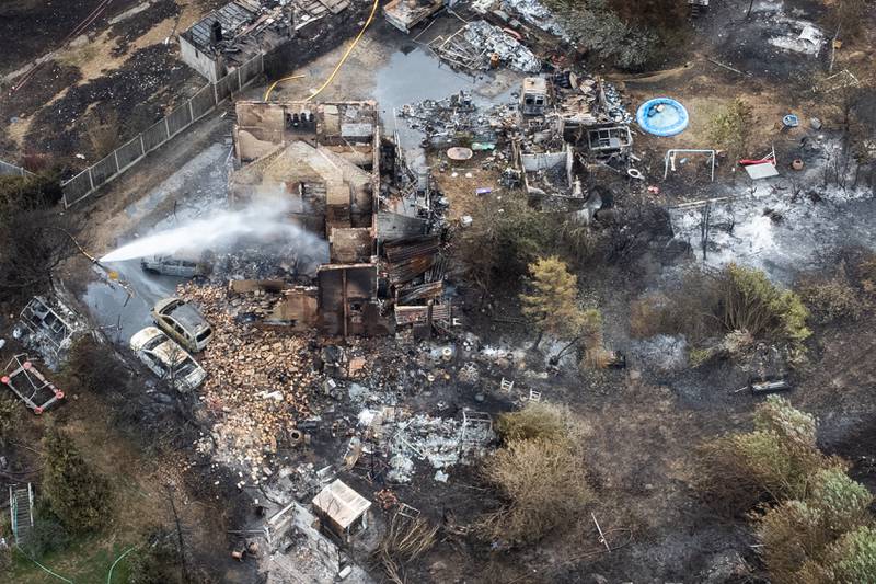 A residential area after a large fire in Wennington, Greater London. Several fires broke out across England as the UK experienced a record-breaking heatwave. Getty Images