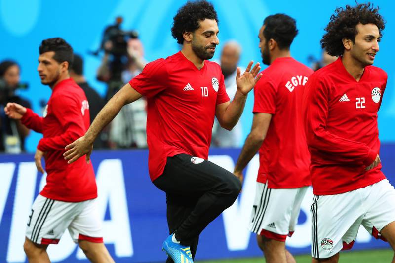 Egypt's Mohamed Salah, centre, and his teammates attend a training session in Saint Petersburg. Tolga Bozoglu / EPA
