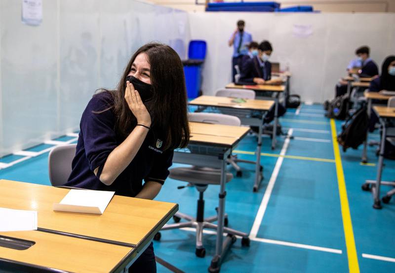 Abu Dhabi, United Arab Emirates, March 3, 2021.  Pupils receive some of their IGCSE and International A-level results for January session 2021. Pupils celebrating after recieving receiving results.Victor Besa / The NationalSection:  NAReporter:  Anam Rizvi
