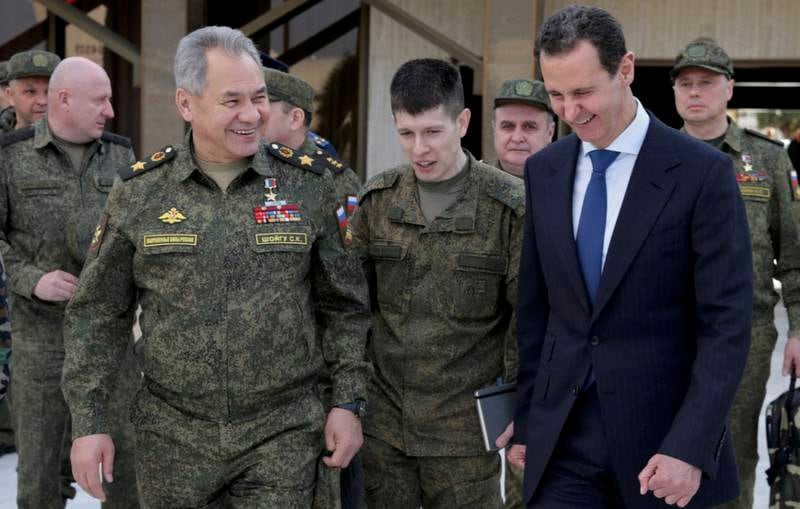 Russia has a large military presence in Syria to bolster Mr Al Assad, right, in the continuing civil war. EPA