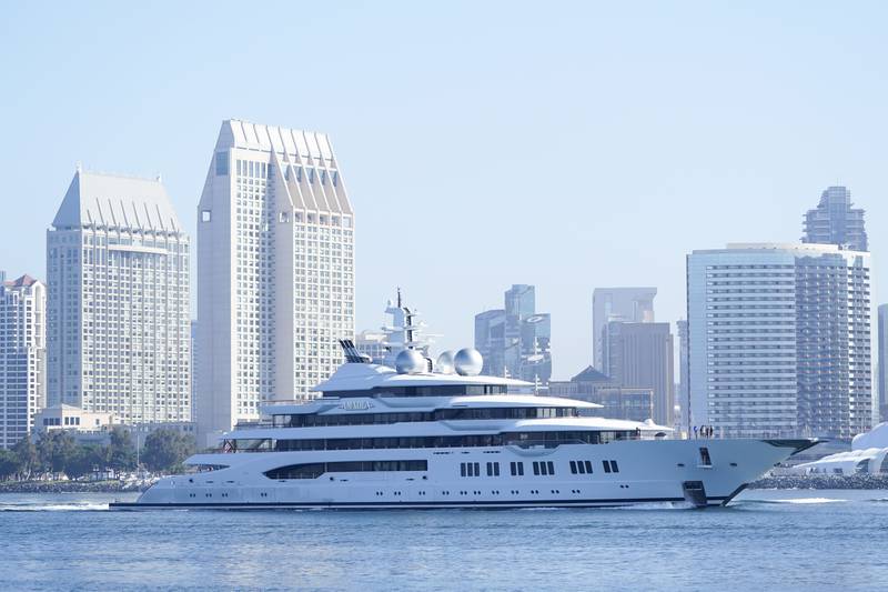 The super yacht Amadea passes San Diego as it comes into the San Diego Bay Monday, June 27, 2022, seen from Coronado, Calif.  The $325 million superyacht seized by the United States from a sanctioned Russian oligarch arrived in San Diego Bay on Monday.  (AP Photo / Gregory Bull)