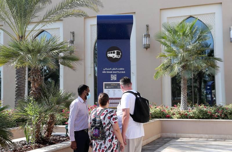 Residents and tourists can claim free access to the shuttle bus once they have booked their hotel stay or bought admission tickets for any Abu Dhabi attractions using the Visit Abu Dhabi online booking platform. Pawan Singh / The National