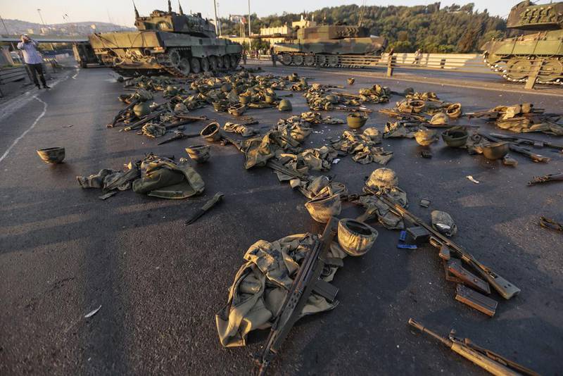 Clothes and weapons belonging to Turkish soldiers involved in the coup attempt that have now surrendered lie on the ground abandoned on Bosphorus bridge. Gokhan Tan / Getty Images