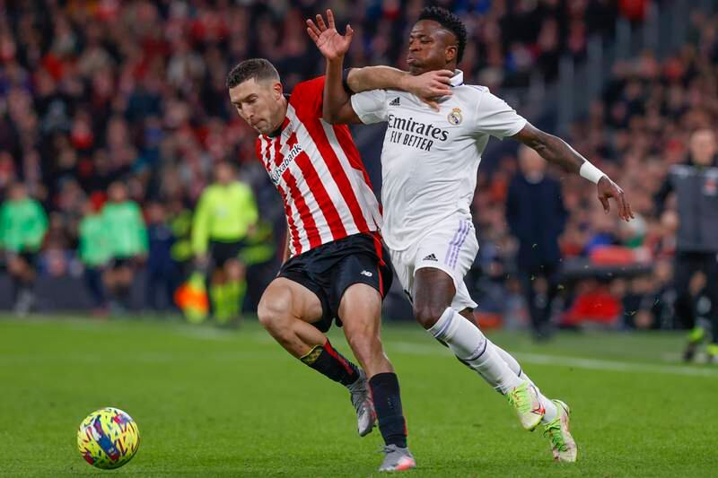 Athletic Bilbao's Oscar de Marcos fights for the ball with Vinicius Junior of Real Madrid. EPA