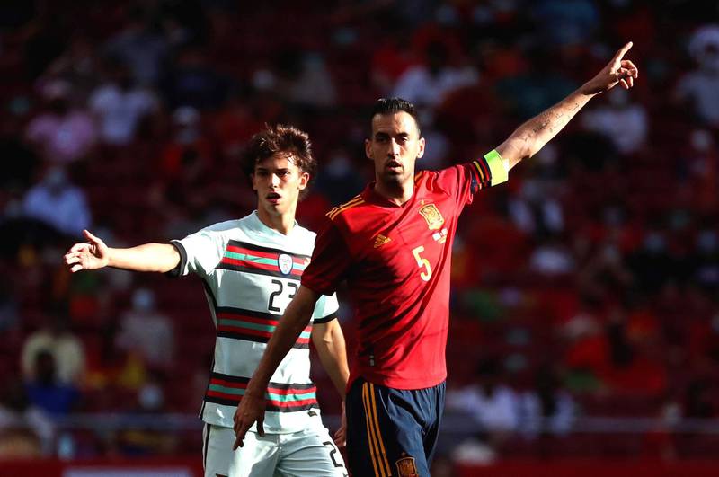 epa09252182 (FILE) - Spain's Sergio Busquets (R) and Portugal's Joao Felix (L) react during the International Friendly soccer match between Spain and Portugal in Madrid, Spain, 04 June 2021 (re-issued 06 June 2021). Spain's captain Sergio Busquets has been tested positive for the coronavirus COVID-19 disease and left Spain's training camp, the Spanish Football Federation (RFEF) confirmed on 06 June 2021. The RFEF announced that Spain's under-21 team will play the upcoming Friendly match against Lithuania on 08 June 2021.  EPA/Kiko Huesca