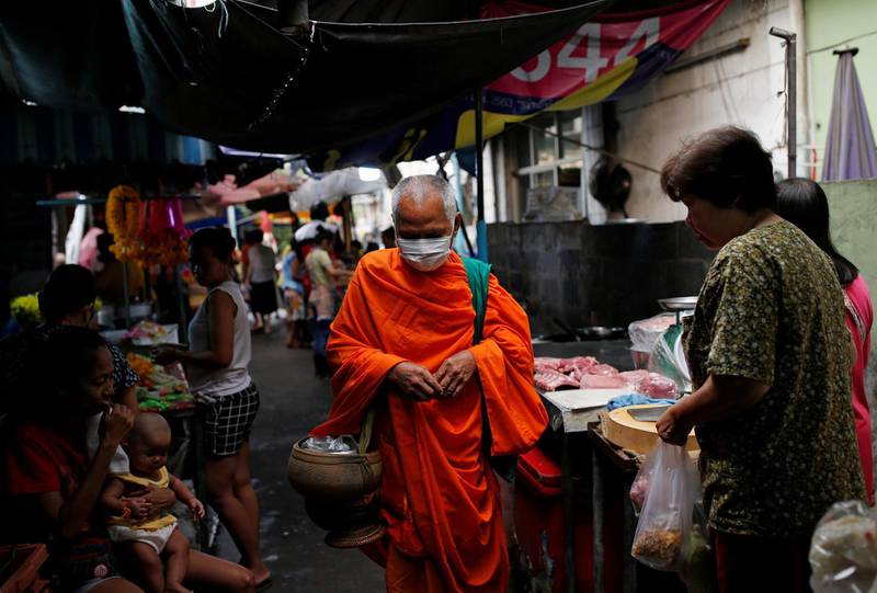 A Buddhist monk wears a mask as a preventive measure against the coronavirus outbreak, in Bangkok, Thailand. Reuters