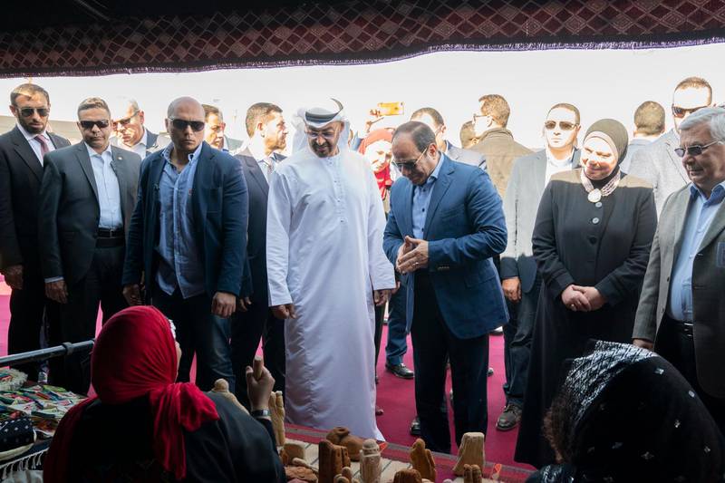 Sheikh Mohamed bin Zayed, Crown Prince of Abu Dhabi and Deputy Supreme Commander of the Armed Forces, and President Abdel Fattah El Sisi of Egypt peruse some of the handicrafts on display at Sharm El Sheikh Hertiage Festival on Wednesday. Courtesy Sheikh Mohamed bin Zayed Twitter