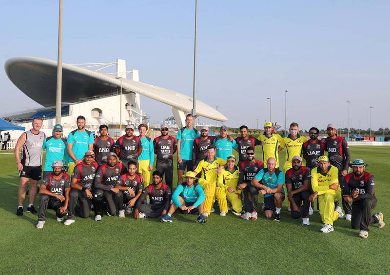 Abu Dhabi, United Arab Emirates - October 22, 2018: The UAE and Australia teams at the end of the match between the UAE and Australia in a T20 international. Monday, October 22nd, 2018 at Zayed cricket stadium oval, Abu Dhabi. Chris Whiteoak / The National