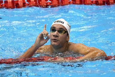 Ahmed Hafnaoui of Tunisia celebrates after winning the men's 1500m freestyle final at the World Swimming Championships in Fukuoka, Japan, on Sunday, July 30, 2023. AP