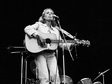 Joni Mitchell performs live on stage at Wembley Stadium, London on 14th September 1974. Photo / Redferns