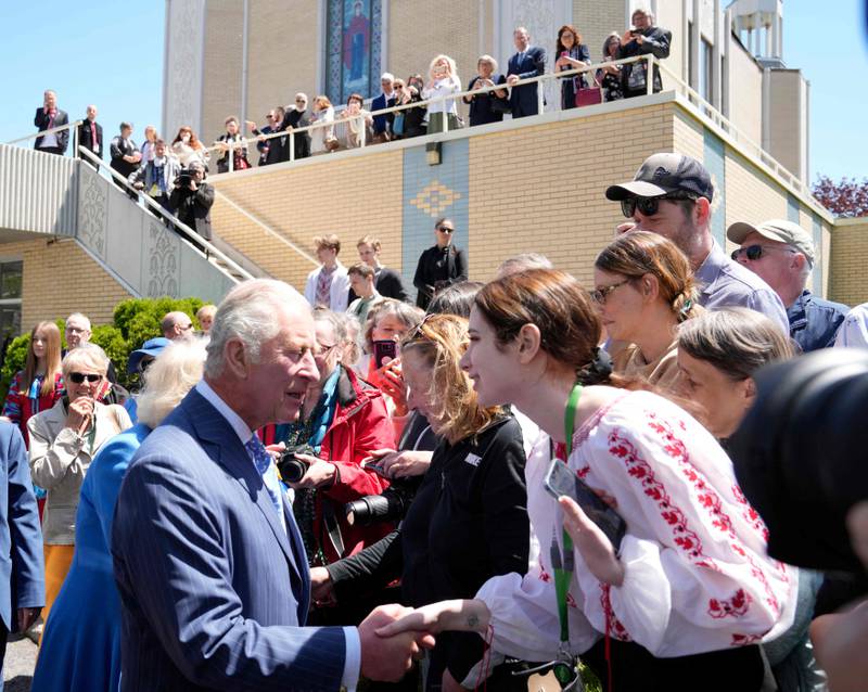 Britain's Prince Charles greets a well-wishers after leaving a Ukrainian church in Ottawa on their Canadian Royal Tour, on May 18, 2022. AFP