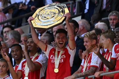 Arsenal's Declan Rice lifts the FA Community Shield trophy after their win against Manchester City. AFP