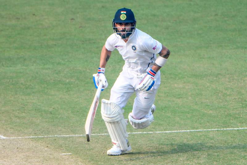 India's captain Virat Kohli runs during the second day of the second Test cricket match of a two-match series between India and Bangladesh at the Eden Gardens cricket stadium in Kolkata on November 23, 2019. IMAGE RESTRICTED TO EDITORIAL USE - STRICTLY NO COMMERCIAL USE
 / AFP / Dibyangshu SARKAR / IMAGE RESTRICTED TO EDITORIAL USE - STRICTLY NO COMMERCIAL USE
