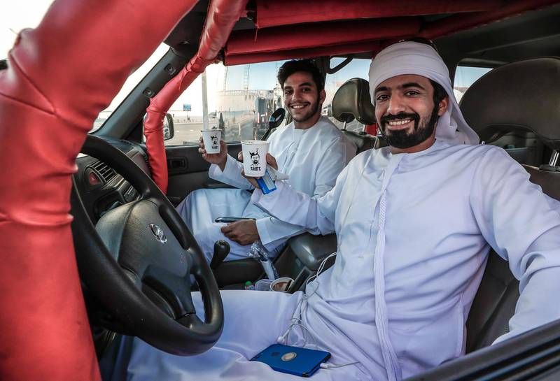 Abu Dhabi, U.A.E., October 8, 2016.  Food trucks area of Al Hudayriat Island.-- (L-R) Mohammad Al Mazzrouie and Mohammad Alomeariah with there freshly brewed coffee.Victor Besa / The NationalSection:  WKReporter:  Ellen Fortini