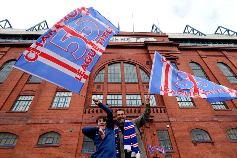 Rangers fans celebrate outside of the Ibrox Stadium after Rangers won the Scottish Premiership title on Sunday, March 7, 2021.