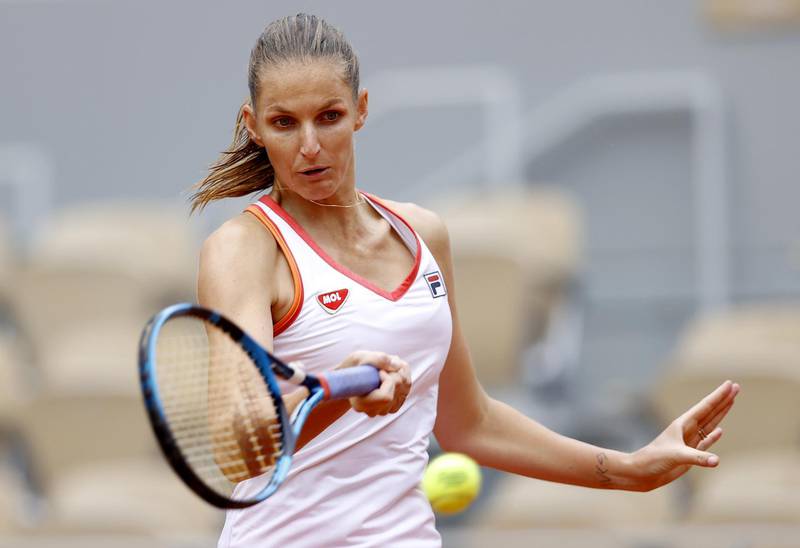epa08705388 Karolina Pliskova of the Czech Republic hits a forehand during her first round match against Mayar Sherif of Egypt at the French Open tennis tournament at Roland Garros in Paris, France, 29 September 2020.  EPA/IAN LANGSDON