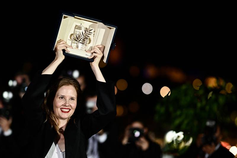 French director Justine Triet with her the Palme d'Or. AFP