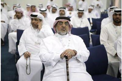 FNC candidates wait for results at the Al Ain Exhibition Centre on Saturday. Sammy Dallal / The National