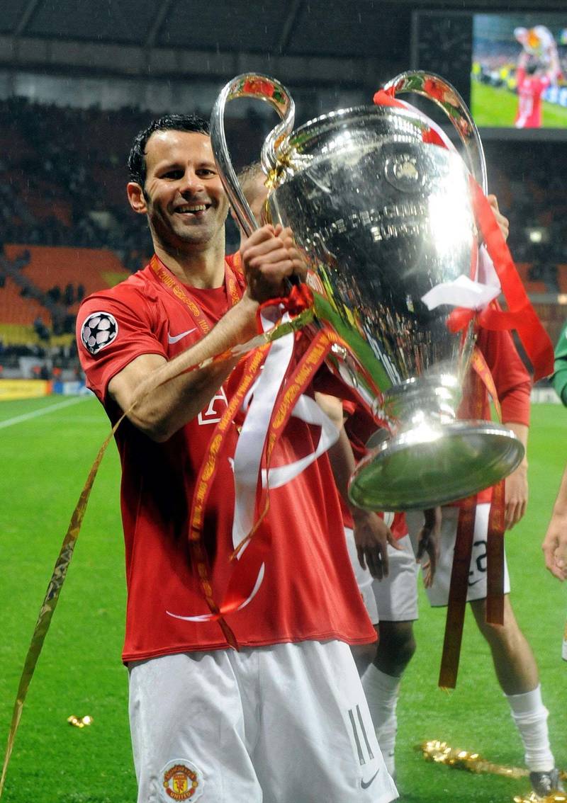 Ryan Giggs celebrates with the Champions League trophy in 2008. PA Wire.