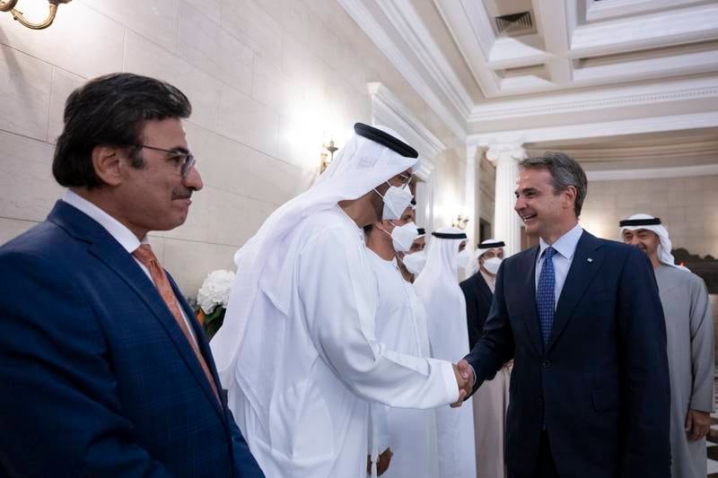 Dr Sultan Al Jaber, Minister of Industry and Advanced Technology, is received by Mr Mitsotakis alongside Sulaiman Al Mazroui, UAE Ambassador to Greece.