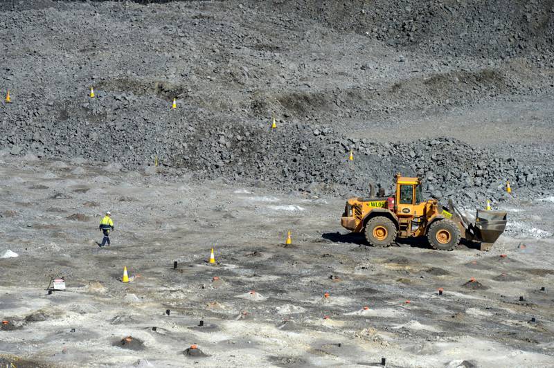 A worker set an area for explosives on a mine floor at the Bald Hill lithium mine site, co-owned by Tawana Resources Ltd. and Alliance Mineral Assets Ltd., outside of Widgiemooltha, Australia, on Monday, Aug. 6, 2018. Australia’s newest lithium exporter Tawana is in talks with potential customers over expansion of its Bald Hill mine and sees no risk of an oversupply that would send prices lower. Photographer: Carla Gottgens/Bloomberg