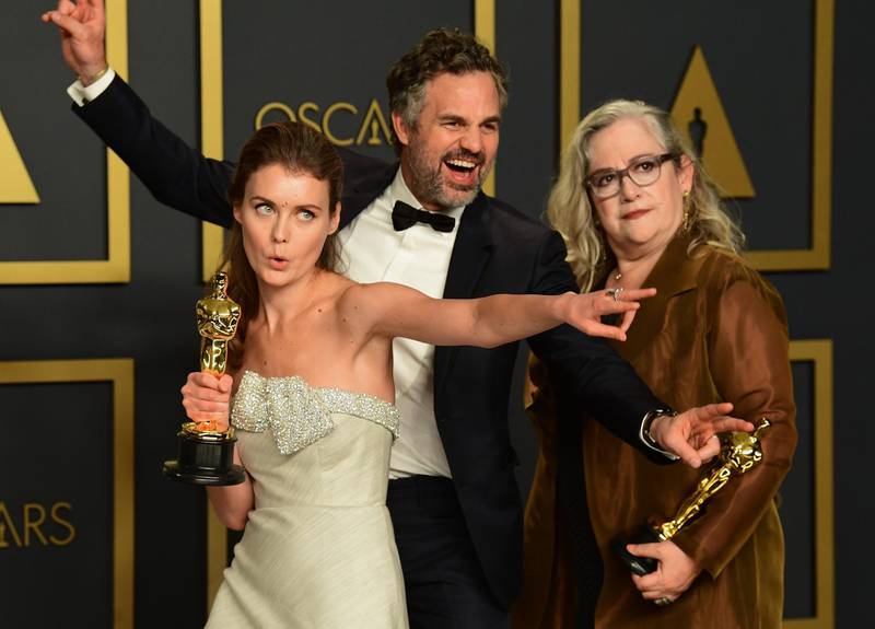 US filmmaker Carol Dysinger (R) and director Elena Andreicheva (L) poses in the press room with the Oscar for Best Short Subject Documentary for "Learning to Skateboard in a Warzone (If You're a Girl)" along with US actor Mark Ruffalo during the 92nd Oscars. AFP