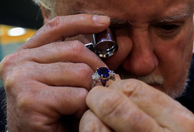 Pietro Bajocchi, 70, of Bajocchi Jewellers, looks at a diamond ring . The company was founded in the 1900s and established by the Italian Bajocchi family, in downtown Cairo. Reuters
