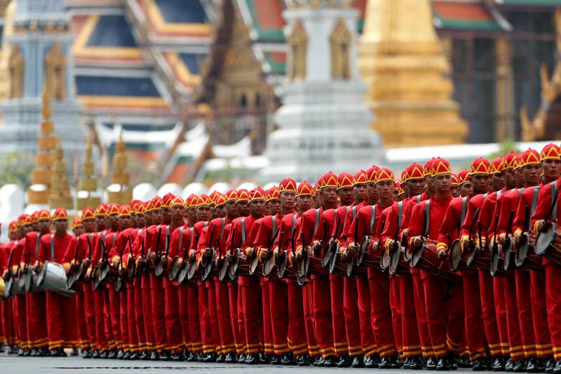 Drummers take part in the royal cremation procession of late King Bhumibol Adulyadej at the Grand Palace in Bangkok, Thailand. Jorge Silva / Reuters.