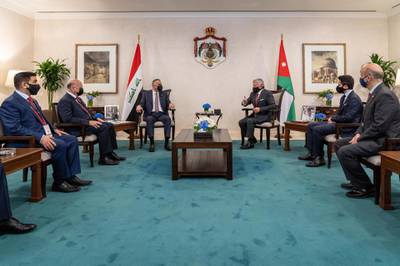 King Abdullah II of Jordan and Iraqi Prime Minister Mustafa Al Kadhimi talking ahead of the trilateral meeting in Amman, Jordan, 25 August 2020.  EPA