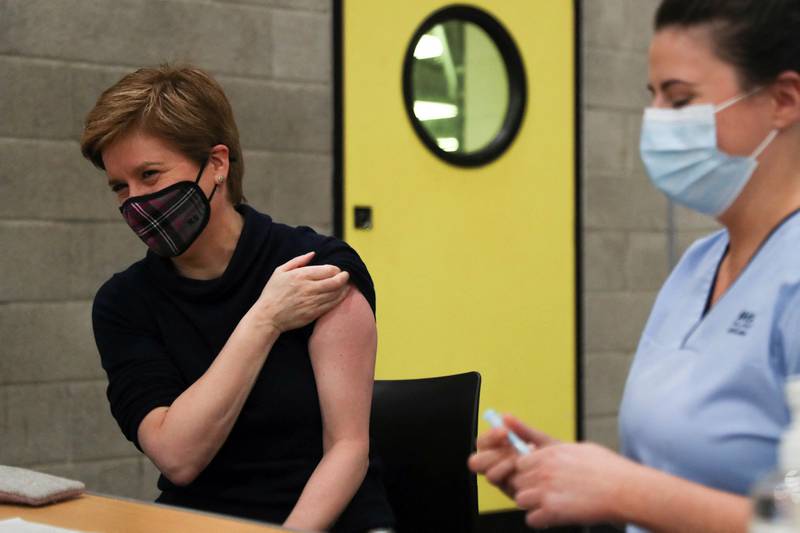 Scotland's First Minister Nicola Sturgeon prepares to receive a Covid-19 booster vaccination in Glasgow. AFP