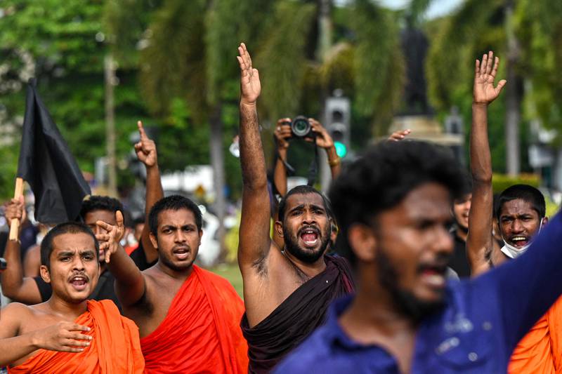 Sri Lankan university monks' take part in the demonstration in Colombo. AFP