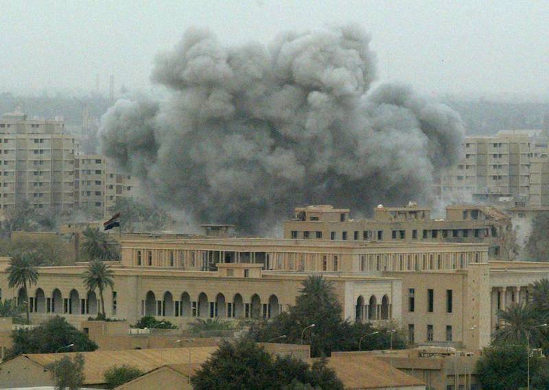 Smoke billows from an explosion behind a government building in the presidential compound in Baghdad, in 2003. AFP