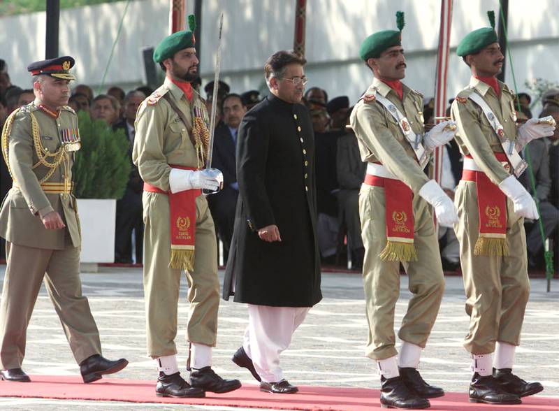 Mr Musharraf inspects an honour guard in Islamabad after taking the oath of office as Pakistan's new president on June 20, 2001, increasing his official stature ahead of his July 14 summit in India. Reuters