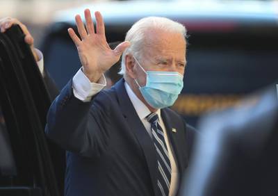 US President-elect Joe Biden arrives at The Queen theatre where he was scheduled to address the media about the Trump administration’s lawsuit to overturn the Affordable Care Act, in Wilmington, Delaware.  AFP