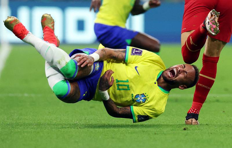 Neymar reacts after a challenge from Serbia'a Sasa Lukic. Reuters