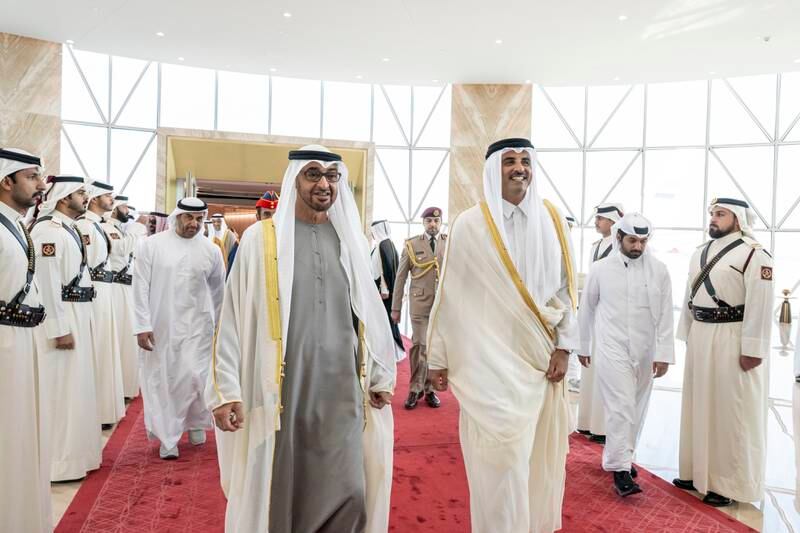 President Sheikh Mohamed is received by Sheikh Tamim, Emir of Qatar, upon arriving at Hamad International Airport in Doha. Mohamed Al Hammadi / Presidential Court