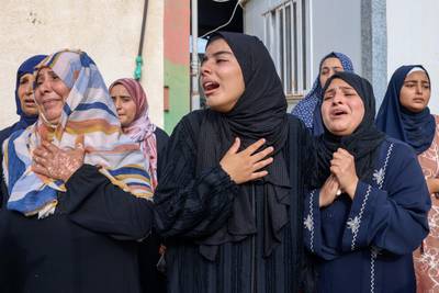 Mourners at the funeral of Palestinians killed in overnight Israeli shelling in Khan Younis in Gaza. AFP