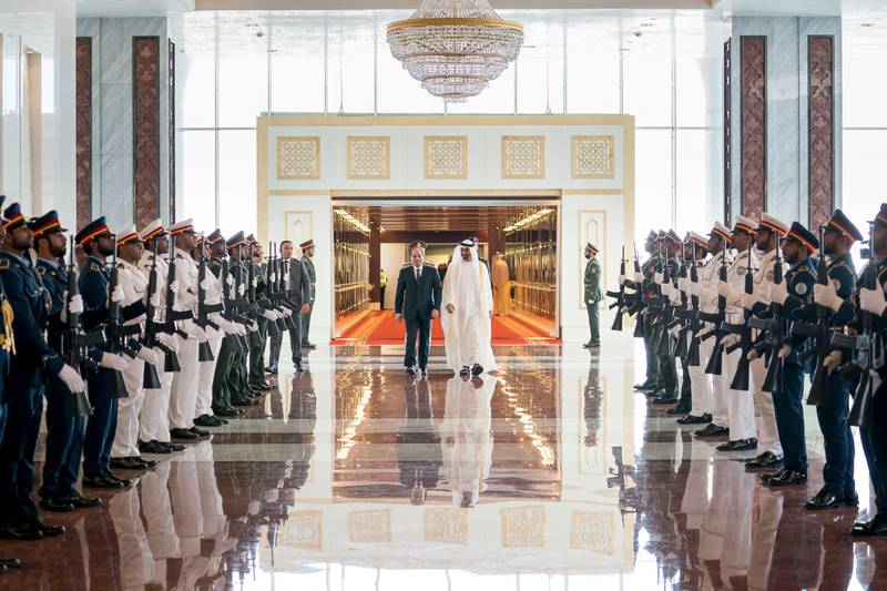 ABU DHABI, UNITED ARAB EMIRATES -September 25, 2017: HH Sheikh Mohamed bin Zayed Al Nahyan Crown Prince of Abu Dhabi Deputy Supreme Commander of the UAE Armed Forces (center R), receives HE Abdel Fattah El Sisi, President of Egypt (center L), at the Presidential Airport. 

( Rashed Al Mansoori / Crown Prince Court - Abu Dhabi )
---