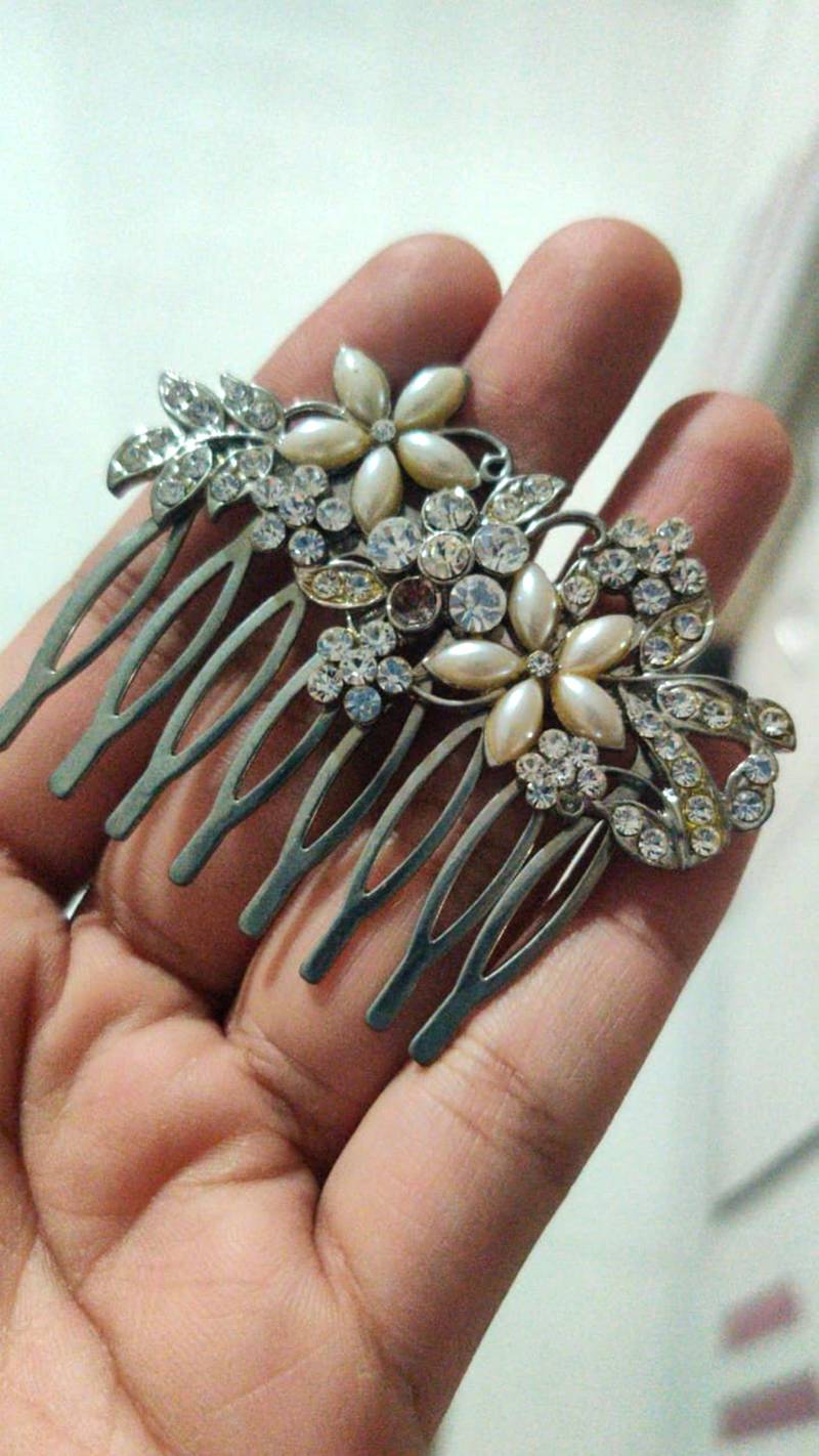 Decluttering can help you unearth lost or forgotten treasures, such as this writer's silver and pearl comb. Sonali Kokra for The National 