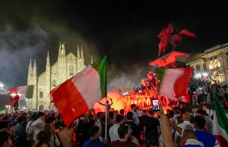 Italian fans celebrate in Rome after winning the Euro 2020 final against England at Wembley.