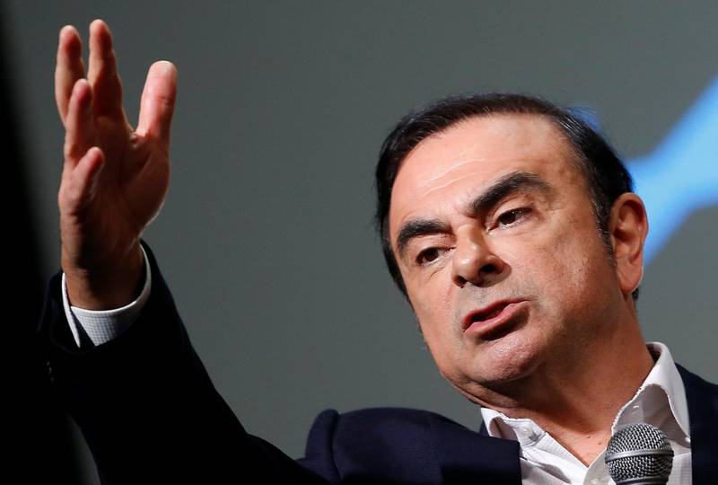 FILE PHOTO - Carlos Ghosn, Chairman and CEO of the Renault-Nissan Alliance, gestures as he speaks during the presentation of the Renault's new Alpine sports concept car "Vision" in Monaco February 16, 2016. REUTERS/Eric Gaillard/File Photo